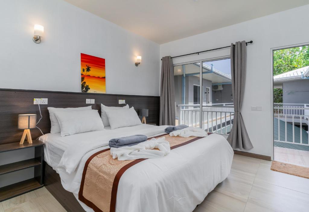 Double room interior with balcony view